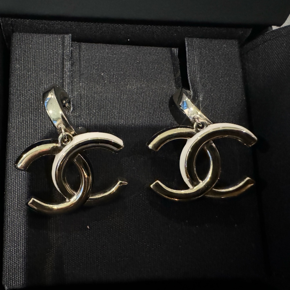 Gold and white Chanel earring